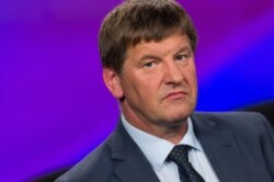 FILE - Franc Bogovic of the Slovenian People's Party takes part in a televised debate ahead of elections in Ljubljana, Slovenia, June 26, 2014.