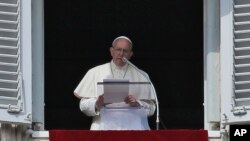 Pope Francis delivers a message from his studio window overlooking St. Peter's Square on the occasion of hishe Angelus noon prayer, at the Vatican, Feb. 21, 2016.