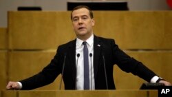 FILE - Russian Prime Minister Dmitry Medvedev addresses the State Duma in Moscow, April 22, 2014.