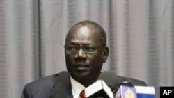 FILE - South Sudanese information minister, Michael Makuei Lueth attends a press conference in Addis Ababa, Jan. 5, 2014.
