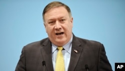U.S. Secretary of State Mike Pompeo speaks at a press conference on the sidelines of the 51st ASEAN Foreign Ministers Meeting in Singapore, Saturday, Aug. 4, 2018. 