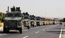 A Turkish miltary convoy is pictured in Kilis near the Turkish-Syrian border, Turkey, Oct. 9, 2019.