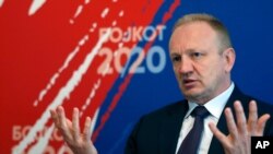 Serbia’s opposition Leader Dragan Djilas, in an interview with the Associated Press, in Belgrade, Serbia, June 17, 2020, says taking part in the vote amid the coronaviorus pandemic and without free media would only legitimize what he called a ‘hoax vote.’