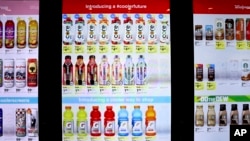 This March 7, 2019, photo shows a smart shelf area at Walgreen's in Chicago. The company installed cooler doors with cameras and sensors at six locations in Chicago, New York, San Francisco and Bellevue, Washington. (AP Photo/Teresa Crawford)