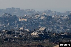Gazze'nin büyük bölümü saldırılar neticesinde yıkıma uğramış durumda.