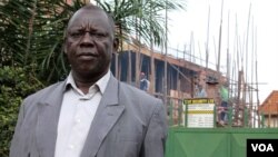 Oloka Mesilamu, who represents Ugandan construction workers, is fighting for a minimum wage, June 13, 2014. (Hilary Heuler / VOA News)