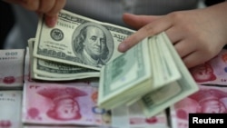 Mayoritas warga AS menganggap utang Amerika sebesar 1,27 triliun dolar kepada China sangat serius (foto: ilustrasi).