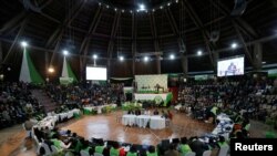 FILE - The Kenyan Independent Electoral and Boundaries Commission prepares to announce election results at the Bomas of Kenya, in Nairobi, Aug. 11, 2017.