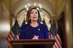 House Speaker Nancy Pelosi of Calif., reads a statement announcing a formal impeachment inquiry into President Donald Trump, on Capitol Hill in Washington, Sept. 24, 2019.