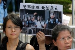Various of activist groups from parents and religious protest outside the government office demanding to stop shooting their kids in Hong Kong, June 20, 2019.