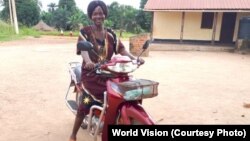 Riding in on her motorbike, Christine Ngbaazande is inspiring girls and women in her South Sudan community to stand up for their rights.