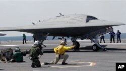 US Navy X-47B drone is launched off aircraft carrier USS George H. W. Bush off the coast of Virginia, May 14, 2013