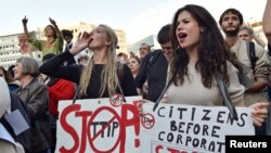 Thousands of people demonstrate against the Transatlantic Trade and Investment Partnership (TTIP) and the EU-Canada Comprehensive Economic and Trade Agreement (CETA) in the center of Brussels, Belgium, Sept. 20, 2016.
