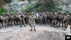 Kundi la mamluki la Wagner pamoja na kiongozi wake wa zamani Yevgeny Prigozhin kabla ya kifo chake cha ajali ya ndege 