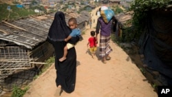 President Joe Biden and first lady Jill Biden visit the place of a shooting at a food store to pay respects and speak to families of the victims of Saturday&#39;s shooting in Buffalo, New York.