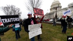 Activists gather on the East Front of the Capitol after the impeachment acquittal of President Donald Trump, on Capitol Hill, Feb. 5, 2020 in Washington.