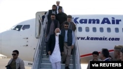 FILE - Afghanistan President Ashraf Ghani arrives in Mazar-i-Sharif to check the security situation of the northern provinces in Afghanistan, Aug. 11, 2021.
