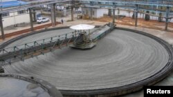 FILE - A general view of a refined copper mine of Jiangxi Copper Company in Dexing, Jiangxi province. Copper is one of the raw materials made more expensive for U.S. manufacturers by the 5 to 20 percent duties