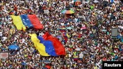 Opposition supporters take part in a rally against Venezuelan President Nicolas Maduro's government in Caracas, Venezuela, Feb. 2, 2019.