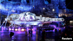 In this file photo, guests explore "Star Wars: Galaxy's Edge" near a Millennium Falcon starship at Disneyland Park in Anaheim, California, U.S., May 29, 2019. (REUTERS/Mario Anzuoni/File Photo)