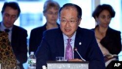 World Bank Group President Dr. Jim Yong Kim speaks during a World Bank Group town hall at the World Bank Group in Washington, Oct. 8, 2014.