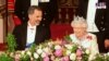 FILE - Britain's Prince William, left, and Spain's King Felipe sit in a carriage after the Order of The Garter Service at Windsor Castle in Windsor, June 17, 2019. 