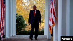 U.S. President Donald Trump walks down the West Wing colonnade from the Oval Office to the Rose Garden to deliver an update on the so-called "Operation Warp Speed" program, the joint Defense Department and HHS initiative that has struck deals with several