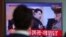 A man watches a TV news program showing a file footage of North Korean leader Kim Jong Un, at Seoul Train Station in Seoul, South Korea, Wednesday, April 5, 2017.