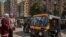Toktoks are waiting for passengers at the subway station of Sayeda Zaynab in old Cairo. (H. Elrasam/VOA)