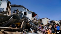 필리핀 세부주 탈리세이 마을의 주택들이 18일 슈퍼 태풍 '라이'로 인해 파손됐다. 