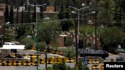 A general view shows the concrete barriers at the entrance to the U.S. embassy in Sanaa, Yemen, August 7, 2013. 