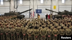 British Defense Secretary Gavin Williamson visits United Kingdom troops of the NATO Enhanced Forward Presence battle group at the military base in Tapa, Estonia, March 25, 2018.