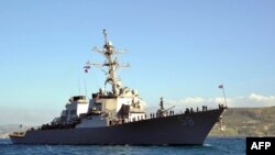 This U.S. Navy handout photo taken on April 29, 2015, shows the USS Laboon sailing into Souda Bay, Greece. The U.S. military said on Jan. 14, 2024, that its forces shot down a cruise missile fired at the American destroyer from a Houthi-controlled area of Yemen.