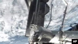 美国航天飞机项目将随着亚特兰蒂斯号结束最后一次使命而划下句号。图为亚特兰蒂斯号7月10日停靠在国际空间站