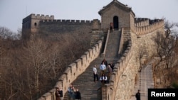 Chinese officials are being pilloried over the smoothing-over of a crumbling but much-loved 700-year-old section of the Great Wall of China.