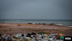 An uncontained garbage dump lies next to Virage Beach in Dakar, Senegal. (A. Hammerschlag/VOA)