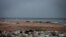 An uncontained garbage dump lies next to Virage Beach in Dakar, Senegal. (A. Hammerschlag/VOA)