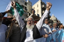 Pakistanis rally to express solidarity with Indian Kashmiris struggling for their independence, in Karachi, Pakistan, March 4, 2020.