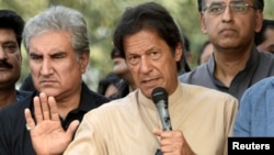 Pakistani opposition leader Imran Khan talks to media outside his house in Islamabad, Pakistan, Nov. 1, 2016. Instead of a protest, Khan plans a celebration after the Supreme Court's decision to look into the "Panama Papers." 