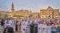 Men gather in Giza, just outside Cairo, for Eid prayers Wednesday.