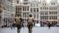Belgian soldiers patrol in the Grand Place of Brussels following Tuesday's bombings in Brussels, Belgium, March 24, 2016. 