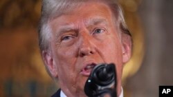 FILE - President-elect Donald Trump speaks during a news conference in Palm Beach, Florida, Dec. 16, 2024. On Friday, he threatened the 27 countries that make up the European Union with tariffs unless they imported more goods from the U.S.