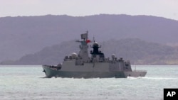 FILE - In this photo provided by the Australian Defense Force, the People's Liberation Army-Navy Jiangkai-class frigate Hengyang travels in the Torres Strait off Australia's coast, Feb. 11, 2025. 