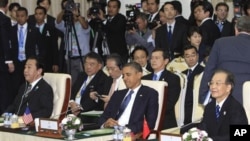 日本首相野田佳彦、美国总统奥巴马和中国总理温家宝11月20日在东盟峰会上