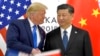 Presiden AS Donald Trump dan Presiden China Xi Jinping dalam pertemuan di sela KTT G20 di Osaka, 29 Juni 2019 (foto: dok). 