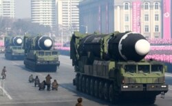 FILE - This photo taken Feb. 8, 2018, and released on Feb. 9, 2018, by North Korea's official Korean Central News Agency (KCNA) shows Hwasong-15 ballistic missile during the military parade in Pyongyang, North Korea.
