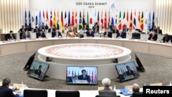 Perdana Menteri Jepang Shinzo Abe berbicara selama KTT G20 di Osaka, Jepang, pada 29 Juni 2019. (Foto: Kazuhiro Nogi/Pool via Reuters)