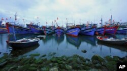 FILE - Fishing boats are docked in Tho Quang port, Danang, Vietnam, March 26, 2016. 
