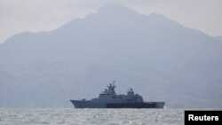 A Malaysian navy vessel patrols waters near Langkawi island, May 17, 2015. 