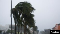 Debris is seen on the road after Hurricane Grace made landfall on the Yucatan Peninsula, in Cancun, Mexico, Aug.19, 2021.